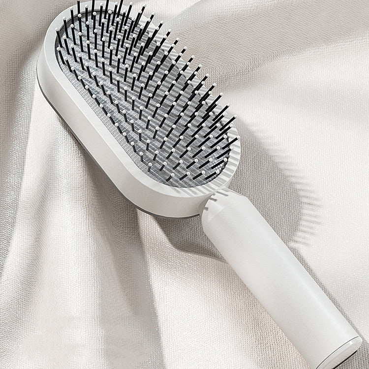 PureDetangle self-cleaning detangling hair brush - product photo 2 - AVALDEY