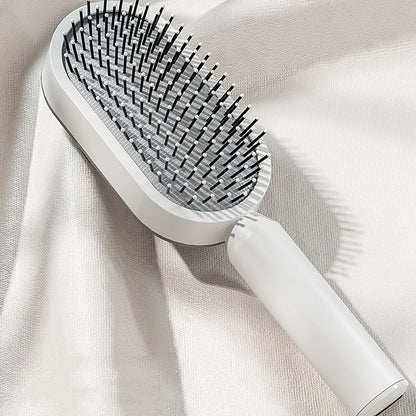 PureDetangle self-cleaning detangling hair brush - product photo 2 - AVALDEY